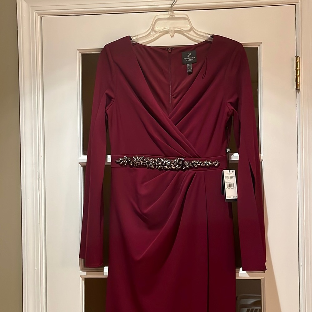 Adrianna Papell long evening gown with beaded details.